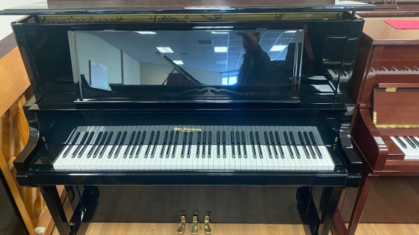 Altenburg 52” professional upright Piano.