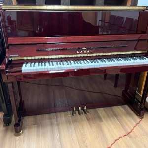 Kawai Upright player with Pianodisc IQ system.