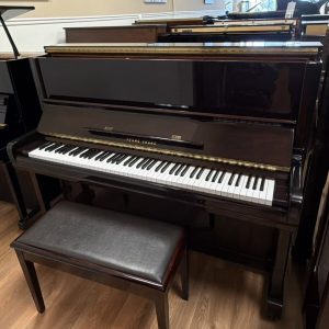 Yamaha 48" upright piano. Young Chang
